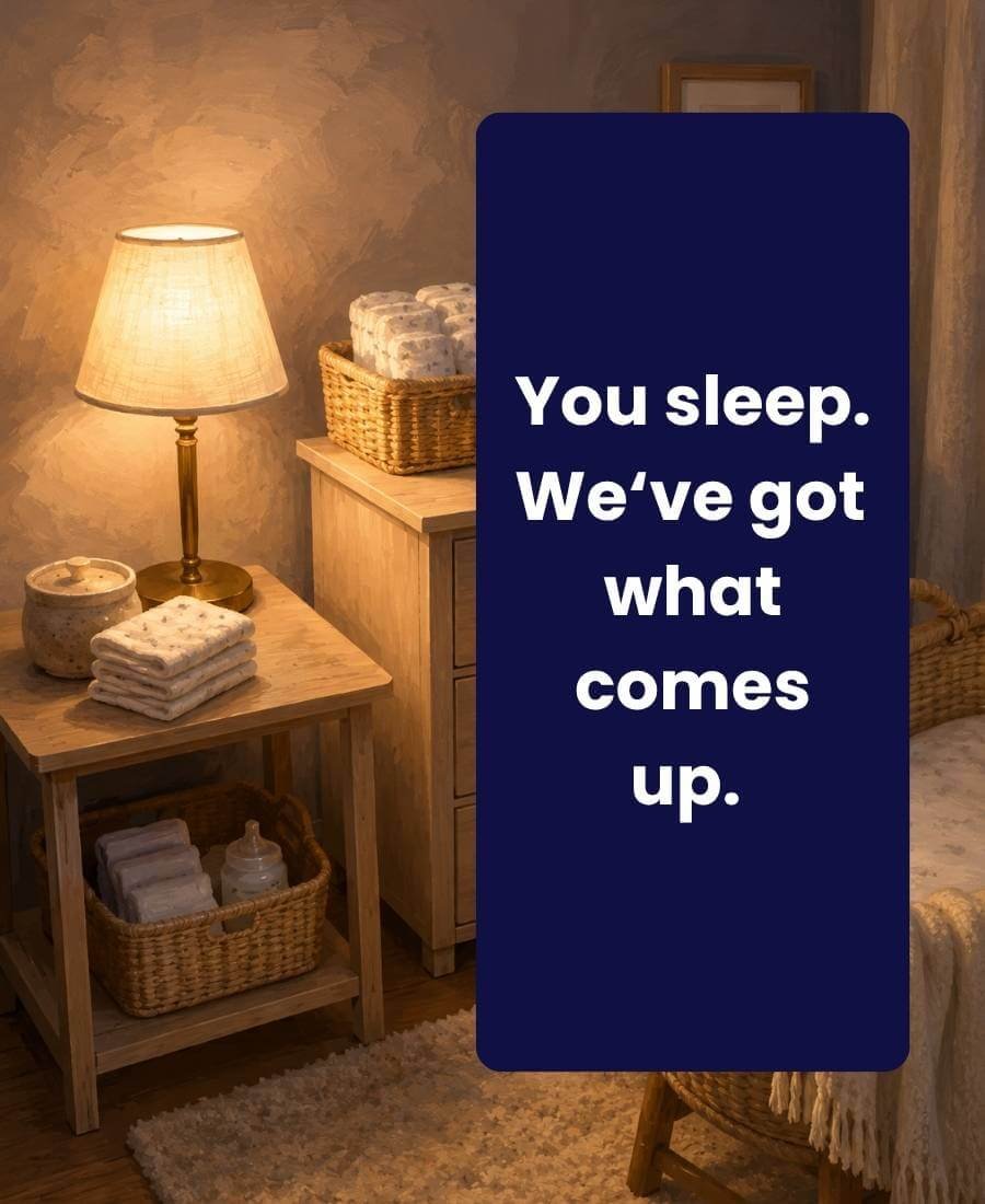 A Cradira overnight postpartum support setup with a bassinet, warm lamp, baby monitor, feeding supplies, and quote card reading “You sleep. We’ve got what comes up.
